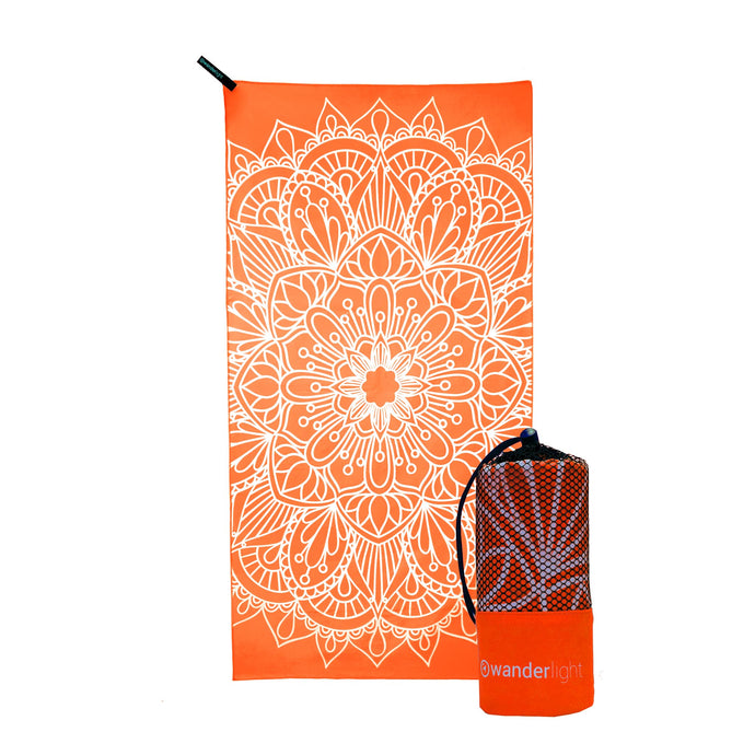 orange towel with large white mandala print, hang loop on upper left corner and branded orange carrying pouch