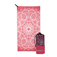 Load image into Gallery viewer, coral pink towel with large white mandala print, hang loop on upper left corner and branded pink carrying pouch