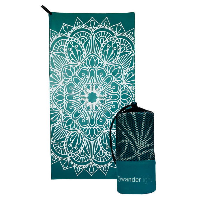 teal towel with large white mandala print, hang loop on upper left corner and branded teal carrying pouch